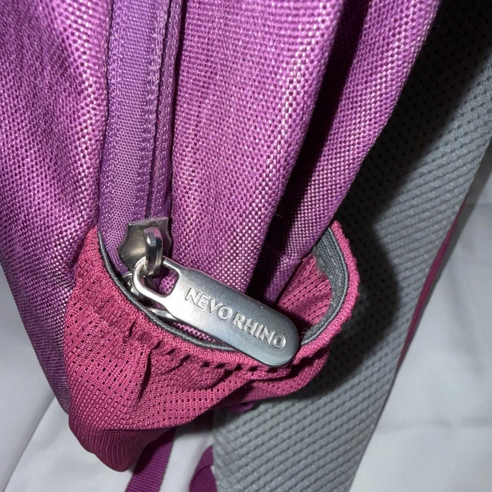 Nevo Rhino Sling Crossbody Bag Back Pack Backpack New W/O Tags Purple or Pink